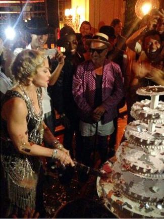 styles medium public images blog posts Joel Perry 2014 08 18 Madonna cutting bd cake
