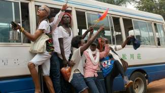 Members of Uganda's gay and transgender community yell "we want peace" after police forced them to leave the gay pride festival in Entebbe, Uganda, Saturday, Sept. 24, 2016. (AP Photo/Katie G. Nelson) styles medium public images blog posts Adam Dupuis 2016 09 26 1474736521839