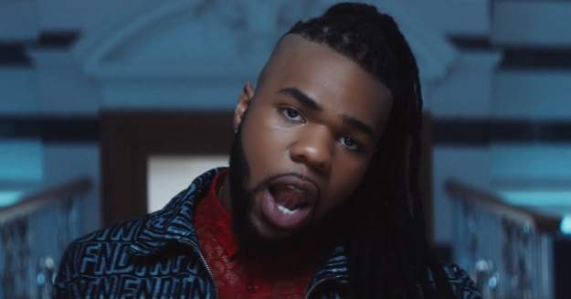 Screenshot via Youtube @MNEKVEVO styles large public images blog posts Devin Randall 2018 03 23 MNEKTongue2