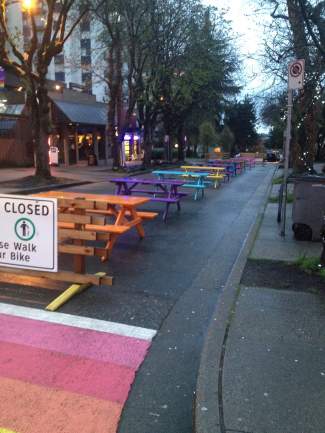 Down at the end of Vancouver's gayborhood is where you will find the view of the crosswalks and tables.