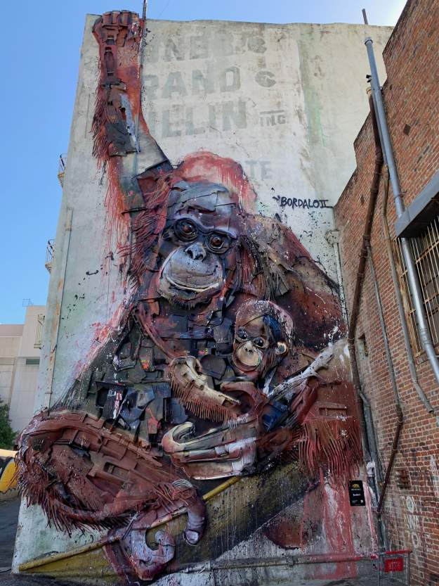 One of the murals seen during our tour. Would you believe it is made of all garbage attached to the side of the building?