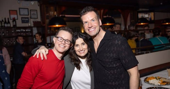 Michael DAngora Idina Menzel and Tom DAngora a the West Bank Cafe pto Michael Hull e1779661415733